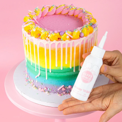 Drip Fun Cakes mit Belag aus WEISSER SCHOKOLADE Drip Fun Cakes mit Belag aus WEISSER SCHOKOLADE